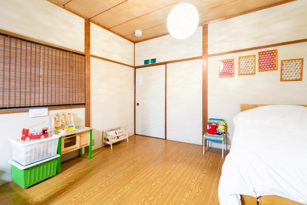 Chikyuutabikazoku Usj Apartment Osaka Bagian luar foto